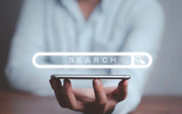 businessman-holding-smartphone-with-virtual-search-engine-browser-information-technology-concept businessman-holding-smartphone-with-virtual-search-engine-browser-information-technology-concept