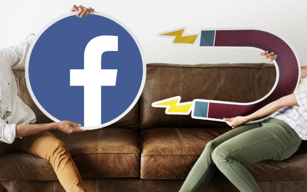 people-holding-facebook-icon people-holding-facebook-icon
